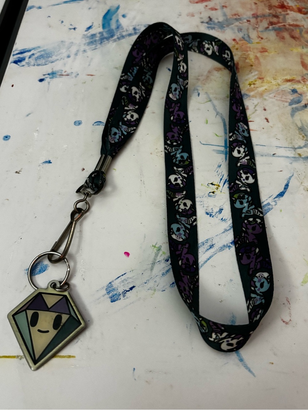 tokidoki Lanyard with various different mermicornos on strap and Diamond Charm